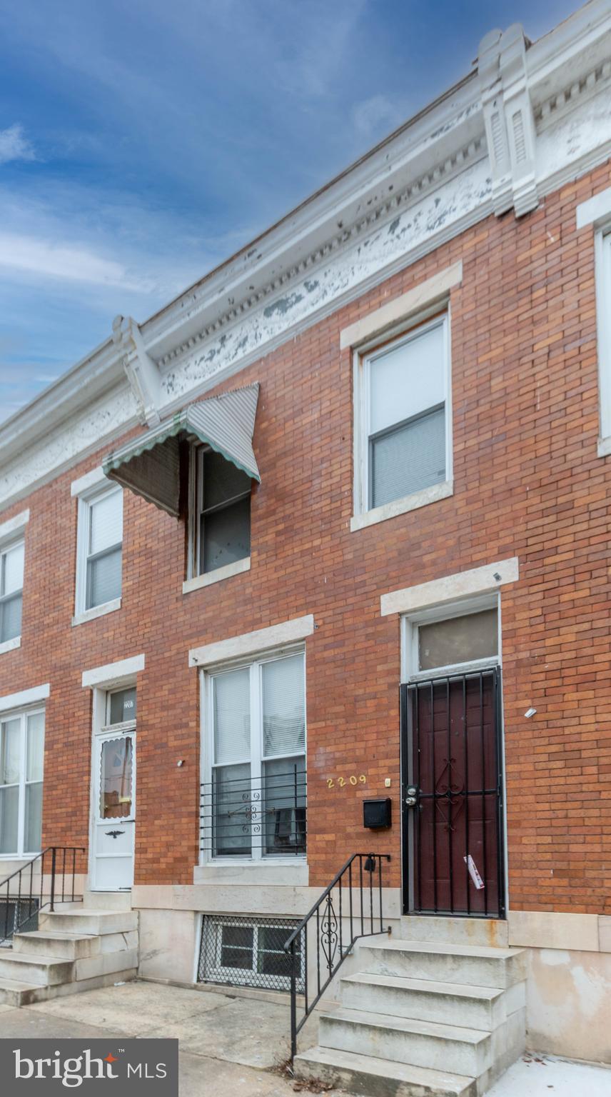 List price to be opening bid at online only auction. Online auction to be conducted on Auctioneers website. Bidding will begin on Saturday, April 26th & ends Thursday, May 1, 2025 at 1:30PM.Tenant-Occupied Brick-Front Townhouse in the Penrose/Fayette Street Outreach neighborhood of Baltimore City. This home offers 2 bedrooms, a bonus room, 1 full bath, and 1 half bath, along with central A/C for comfort. The fenced backyard features a patio, a covered porch off the rear of the house, and a walkout to the yard. The property has been updated and is Lead-Free. Current Gross Monthly Rent: $1,300. Tenant is responsible for BGE. Main Level: Living area and eat-in kitchen with laminate wood floors, plus a convenient 1/2 bath. Upper Level: 3 bedrooms with laminate wood floors and 1 full bath. Lower Level: Full unfinished basement with a gas meter, forced hot air heat, gas hot water heater, and water pump.