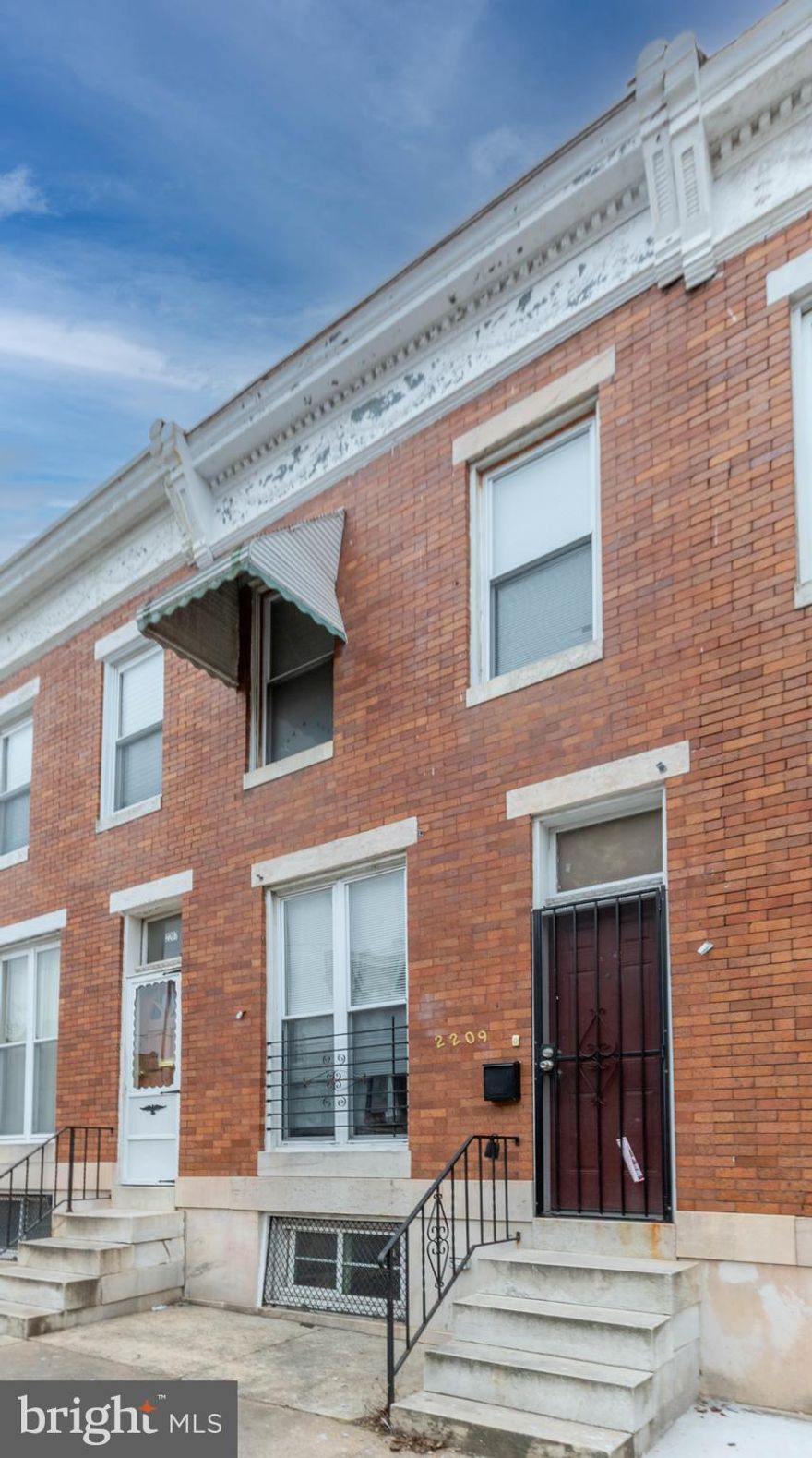 List price to be opening bid at online only auction.  Online auction to be conducted on Auctioneers website. Bidding will begin on Saturday, April 26th & ends Thursday, May 1, 2025 at 1:30PM.Tenant-Occupied Brick-Front Townhouse in the Penrose/Fayette Street Outreach neighborhood of Baltimore City. This home offers 2 bedrooms, a bonus room, 1 full bath, and 1 half bath, along with central A/C for comfort. The fenced backyard features a patio, a covered porch off the rear of the house, and a walkout to the yard. The property has been updated and is Lead-Free. Current Gross Monthly Rent: $1,300. Tenant is responsible for BGE. Main Level: Living area and eat-in kitchen with laminate wood floors, plus a convenient 1/2 bath. Upper Level: 3 bedrooms with laminate wood floors and 1 full bath. Lower Level: Full unfinished basement with a gas meter, forced hot air heat, gas hot water heater, and water pump.