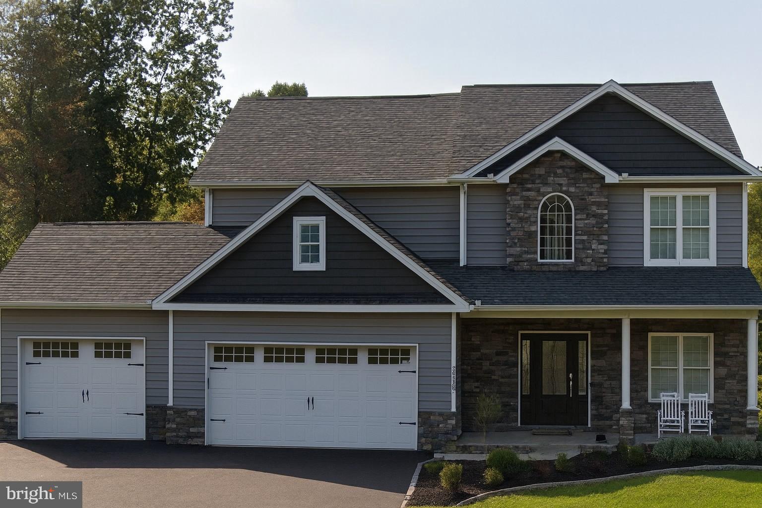Nestled in the serene York Haven community, this to-be-built new construction home offers a perfect blend of luxury and comfort, set on a generous 0.53-acre lot that adjoins open space and backs to lush trees. The architectural charm of a Traditional Colonial style with modern open flair is complemented by high-end materials, including stone and vinyl siding, ensuring both durability and aesthetic appeal. Step inside to discover an inviting open floor plan, where the family room seamlessly flows into a gourmet kitchen, featuring upgraded countertops, an island, and energy-efficient appliances. The spacious breakfast area is perfect for casual dining, while the formal dining area sets the stage for elegant gatherings. With four well-appointed bedrooms, including a primary suite with a walk-in closet and a luxurious bath, this home is designed for relaxation and privacy. The unfinished basement offers endless possibilities for customization, while the main and upper floor laundry hookups add convenience to daily living. Enjoy the benefits of energy-efficient windows and low-VOC finishes that enhance indoor air quality. Outside, the property boasts exterior lighting and an asphalt driveway leading to a two-car garage, providing ample parking. Located in a tranquil rural setting, this home offers a lifestyle of peace and exclusivity, perfect for those seeking a retreat from the hustle and bustle. Experience the ultimate in modern living with this exceptional property, where every detail has been thoughtfully crafted for your comfort and enjoyment.
The photo is of a Sim Model Home. This is a To Be Built, Base Price Home Listing and Exceptional Homes offers this or other larger Plans to customize and build on these Estate Lots in York Haven. Let's talk about designing your brand-new home today.