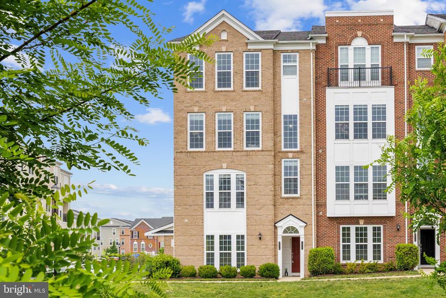 Extraordinary opportunity to own in the Townes of Goose Creek Village! This 3BD/2.5BA, 2600+ sq.ft., **END-UNIT** condo, located on the top 2 floors, lives like a single-family home. Situated atop the highest elevation in eastern Loudoun County, this home affords spectacular views from the living room and primary bedroom with natural light throughout. Location is extremely walkable and only minutes from the new Silver line!

Upon entering the main level, an extensive living room welcomes you into the home with beautiful wood flooring and high, airy ceilings. A convenient powder room off of the living room is great for guests. Through a cased opening, the stunning gourmet kitchen overlooks a generous dining room. Anchored by a spacious kitchen island, miles of granite countertop space and beautiful wood cabinets line the kitchen, which also features modern s/s appliances, gas cooking, deep sink, and pantry. A delightful walk-out balcony overlooks the common areas. Great spot for pairing your choice of beverage with sunshine and fresh air. Upstairs features a generous loft area — an incredible flex space for entertainment, exercise, home office, or all three! The spacious primary bedroom offers stunning views, an enormous walk-in closet, and an ensuite bathroom. The spa-like primary bathroom includes an extra large shower stall with seat and double vanity. Two additional, large bedrooms share a hall bathroom with a tub. A dedicated laundry room houses a full-sized W/D and storage space. 1-car garage, with plenty of street parking for visitors.

Amenity-rich community with a large swimming pool, clubhouse, playground, expansive green space, and walking trails. Walk to Goose Creek Village (variety of dining options: burgers, Tex-Mex, Indian, Lebanese, Korean, Japanese), Harris Teeter, and Walgreens. Less than a 5-min drive to Belmont Station Elem, Trailside MS, and Stone Bridge HS. 15 min to Loudoun County wine country and breweries. Variety of outdoor recreation options (4 golf courses!) within a 2-mile radius. Commuter-friendly location, less than 15 min to Dulles International Airport (IAD), and minutes to Dulles Toll Rd (RT267) and Harry Byrd Hwy (RT7). 8 min to Ashburn Metro Station (Silver Line). 45 minutes to downtown DC. Enjoy single-family home living for the price of a condo! Make this your home today!