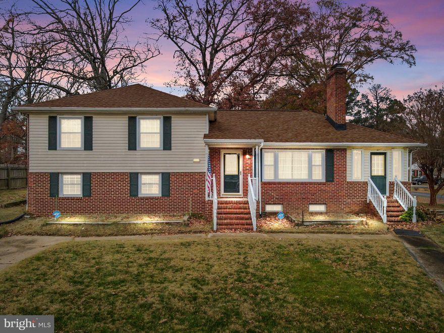 Welcome home! This spacious and inviting tri-level gem is just waiting for the buyer with vision to make it their own. Ideally located, the main level features a bright and airy eat-in kitchen with ample cabinet and counter space, seamlessly flowing into a cozy living room with a wood-burning fireplace and beautiful hardwood floors. Step into the fully enclosed sunroom—perfect for year-round enjoyment. The lower level offers fantastic versatility, including a fourth bedroom with a full bath, a dedicated study/office space, a charming rec room with new carpet and a second wood-burning fireplace, plus a convenient laundry room with an exterior entry. An unfinished utility room adds even more storage or potential workspace. With over 2,250 sq. ft. of living space, this home is perfect for a growing family or those seeking extra room to spread out. The roof is less than five years old, and dual-zone heat pump ensures year-round energy efficiency. Ideally located within walking distance to the school and just minutes from I-295, convenience meets opportunity in this charming home. Bring your vision and make it your own—schedule your showing today! Purchase price and cost of renovation can be wrapped into one loan based on the future value and condition.