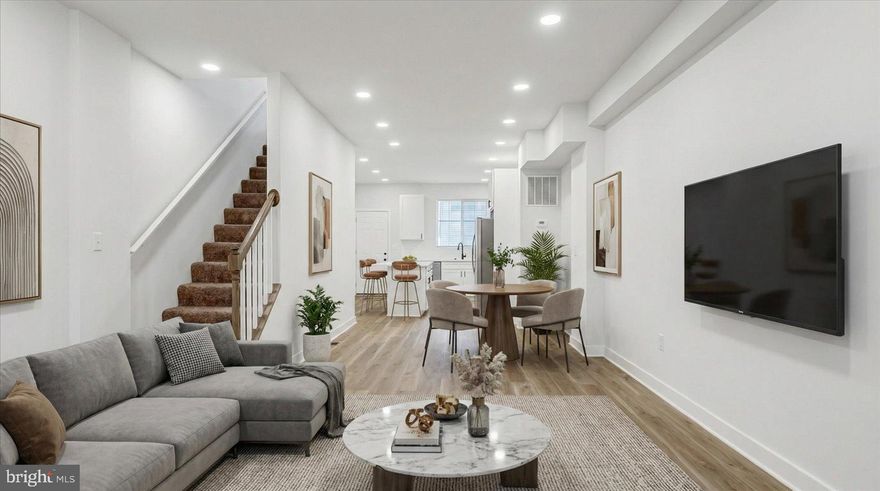 Experience the epitome of luxury living in this stunning Colonial Patterson Park townhouse, beautifully and completely renovated in 2025 from top to bottom. Nestled in the desirable Patterson Park neighborhood, this home seamlessly blends historic charm with modern elegance. The fully finished basement offers versatile space for entertainment or relaxation or an additional bedroom, while the thoughtfully designed layout maximizes natural light throughout. Enjoy high-end finishes that elevate everyday living, from exquisite flooring to custom cabinetry with Quartz countertops and BRAND NEW Whirlpool Package Stainless Steel Appliances. Washe/Dryer Hook-ups installed on Second floor by bedrooms for convenience. The property boasts a generous lot size, providing a serene outdoor retreat for gatherings or quiet moments with a newly installed privacy fence. This residence is not just a home; it's a lifestyle. Embrace the comfort and sophistication that comes with this exclusive property, where every detail has been curated for your enjoyment. Discover the perfect balance of luxury and warmth, making it an ideal sanctuary for those who appreciate the finer things in life.