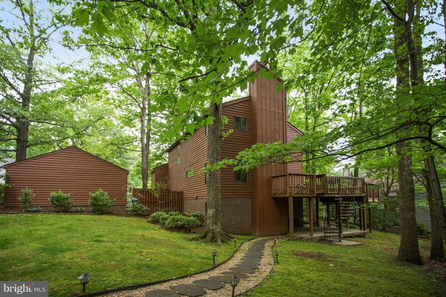 Rare Opportunity: lake views AND privacy.  Contemporary home on one of Reston's most desirable streets.  Dramatic and functional. Soaring ceilings, lofts, skylights, 3 fpl, walk out lower level, 4 BR, 3.5 BA.  Flex in law suite lower.  Natural Gas @ home. Stunning lake views with premium, private undeveloped adjacent lot. Enjoy the tranquility year round. Lake, Paths, Pools, WALK to Metro, OLREA