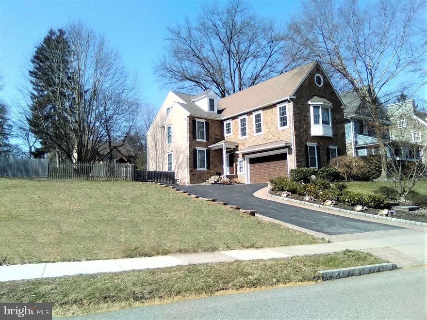Distinguished, highly sought-after North Ardmore established tree-lined neighborhood, with rarely found Sidewalks on a quiet, no-through-traffic street and walk-to location to the Train Station and Suburban Square!! Classic styled 5/6 Bedroom 5.5 Bath Stone home has it all. 2-Story Foyer welcomes with Adobe style rounded-Bullnose walls and detailed architectural moldings that set the tone in this extraordinary residence. Exceptional floor plan, elegant Flared Staircase is open to the formal Living Room and formal Dining Room with crown moldings, hardwood floors and deep baseboard moldings. The impressive 2-Story Family Room with Gas Fireplace has Wall-to-Wall Windows overlooking the serene double-tier Back Lawn and walled Flagstone Terrace. Adjoining Chef's Kitchen is highlighted with a tiered Granite Seating and Prep Island, rich natural wood cabinetry, Double Ovens and 5-Burner Gas Range and Additional Luncheon area. Main floor well-appointed Laundry, Mud Room and Formal Powder Room complete the 1st floor. Luxurious Master Suite features high Tray-ceilings, large custom-seated Bay Window, stylish His & Her double Marble Vanities, Glass Walk-in Shower plus relaxing Jacuzzi, separate Water-Closet, Linen Closet and well-appointed Walk-in Master Closet. 2nd en suite Bedroom, Plus 2 additional very spacious Jack and Jill Bedrooms with custom-fitted Closets complete the 2nd floor. 3rd floor offers a great retreat for guests, or an au pair suite with very large Living Room, 5th Bedroom and Full Bath. Finished lower level has high ceilings, Day-light Windows offers 1000+ square feet of living space; Media Room features handsome Cherrywood custom built-in Entertainment Center and Granite Wet Bar. A Gym with a Full Bath or Office complete the Finished Lower Level. Outstanding amenities include recently installed Back-up Generator, extensive storage custom-fitted closets throughout, Fenced-In property, vacuum system, 3-HVAC zones, Intercom and Security System, attached 2-car garage, Slate Terrace, timer controlled landscape lighting and automatic sprinklers for the landscaping. A coveted location, just steps from Suburban Square, Ardmore Farmer's Market, Trader Joe's, Life Time Fitness, the Apple Store, Starbucks, Amtrak and SEPTA trains, shopping and dozens of restaurants! Award winning Lower Merion schools. Choice District Lower Merion or Harriton High Schools. A turnkey residence across from Suburban Square!