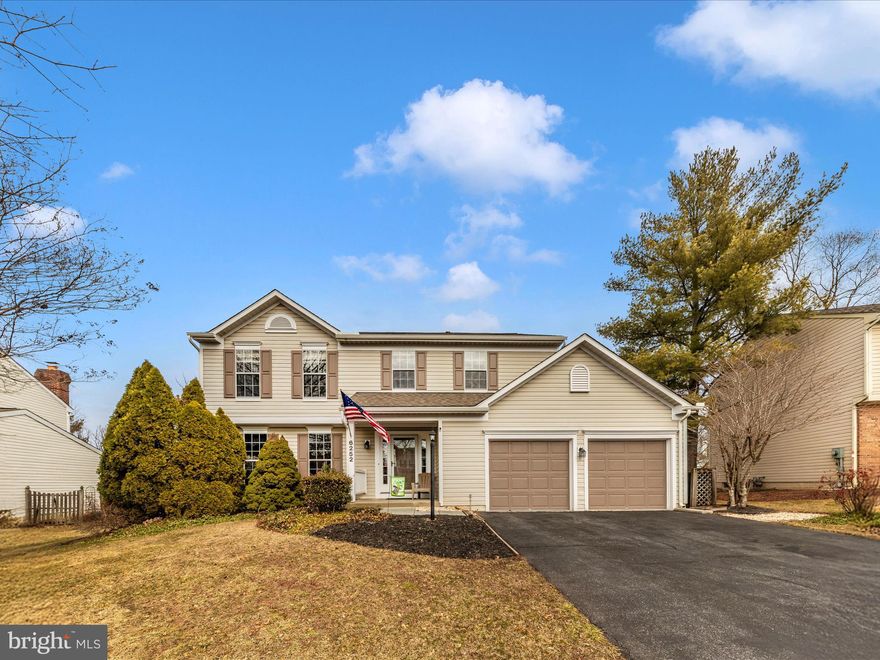 PRICE REDUCTION!  You will appreciate this well-kept and thoughtfully enhanced home in the sought-after Ballenger Creek area. This colonial home offers 4 bedrooms and 2.5 bathrooms and features laminate flooring in the foyer, powder room and kitchen, a large bay window in the living room, a formal dining room, a spacious kitchen with oak cabinets, granite countertops, a convenient island and large table space with another large bay window, that leads into a family room with a cozy gas fireplace. The atrium door leads onto a spacious, well-built outside deck with a flat, large rear yard.  Upstairs you will find 4 bedrooms and 2 full bathrooms. Two of the bedrooms and both bathrooms have luxury vinyl plank flooring, while three of the bedrooms have ceiling fans. The lower level has a recreation room that is over 400 sq. ft. with practical laminate flooring. There are also extensive built-in storage shelves in the unfinished portion of the basement.  The house features natural gas heat and hot water. Located in a private cul-de-sac you will love this Ballenger Creek neighborhood. Easy access to I-70 & I-270 with nearby shopping, restaurants and entertainment.  You can walk directly to the Ballenger Creek Park that features ball fields, playgrounds, a dog park, grills, picnic tables, soccer fields and other multi-purpose fields.  Best of all ... NO CITY TAXES.