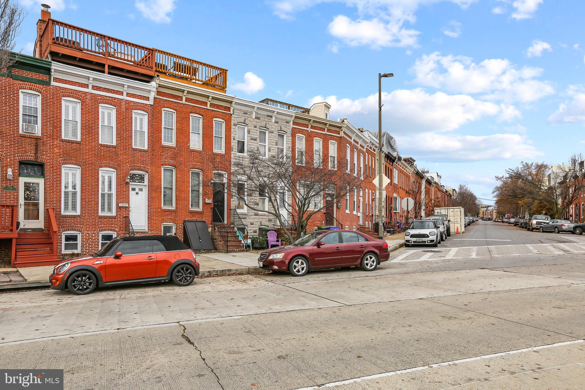 This 2 Bedroom, 2 full bath, with one half bathroom on the main level, has one parking space, and a vast view of the entire harbor. The basement is finished with a bonus room (that could be used as a third bedroom), a hallway, and separate storage room. This home has one of the best water views you can find in the city being directly across from the harbor. This one won't last long.