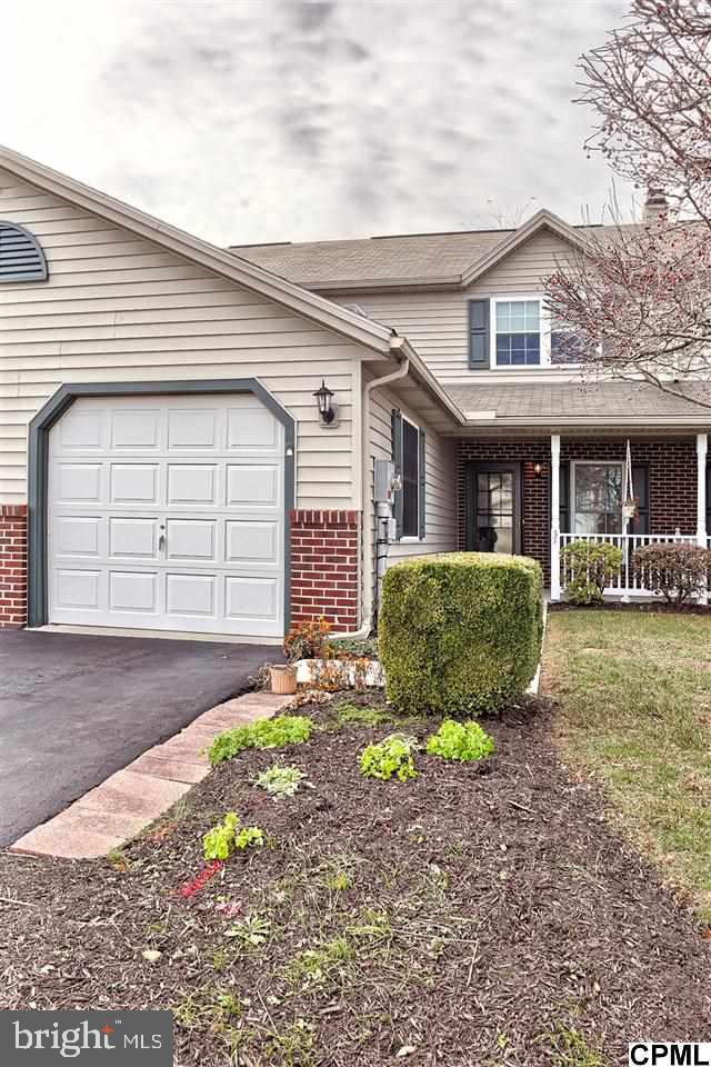Terrific Value! Spacious brick town in desirable Westwood Court. Charming front porch, 1 car garage & neutral throughout. Spacious kit w/abundance of cabinetry, brkfst bar & pantry. DR w/sliders overlooks private patio & yard. NO HOA or high association fees! Vaulted mstr suite w/WIC & private bath. Ref, washer and dryer incld. Great location. Best value on the market! A little TLC will bring instant equity! Move right now!