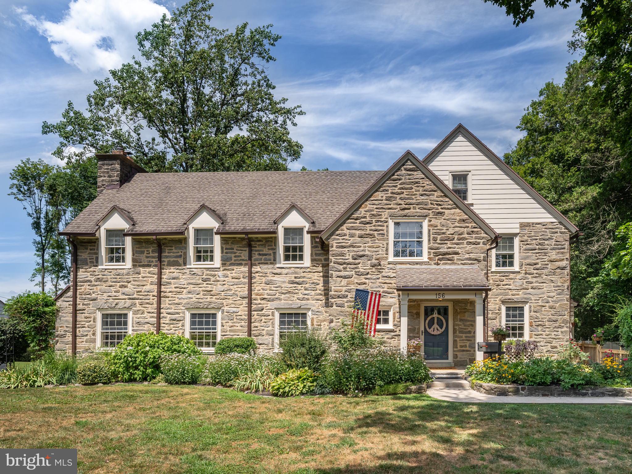 COMING SOON! Lovely home in Merion Golf Manor! Built in 1929 with beautiful seasonal views of Merion East Golf Course, this home, located in Haverford Township, is walkable to Havertown and Ardmore and has easy access to Philadelphia by car or train. Timeless original stone exterior, vintage interior architectural details, hardwood floors throughout, 5400+ sq feet, 7 Bedrooms and 4 1/2 bathrooms offer all of the comfort and space you could want for your personal and entertaining needs. Features include - FIRST FLOOR: 9’ ceilings; understated, yet grand front staircase to 2nd level; rear staircase to 2nd & 3rd floors; oversized living room with fireplace and French doors to covered stone patio; office/sitting room with French doors to same covered stone patio; dining room with built-ins and extra-large (13' x 6') picture window with backyard and golf course views; renovated eat-in kitchen with dedicated covered side entrance and radiant heat. SECOND FLOOR: Primary bedroom showcases extra-large picture (13' x 6') window with backyard and golf course views, primary bath, and linen closet; 4 additional bedrooms with Jack and Jill bathrooms. THIRD FLOOR: 2 bedrooms, sitting area, bathroom with rain shower, and walk-in attic storage. BASEMENT: Unfinished with laundry area runs the footprint of the entire home with endless storage and outside access. GARAGE with original sliding doors. EXTERIOR: Stone, and wide plank fiber cement siding that recreates the original clapboard design. Garden beds with mature perennials, step down flagstone covered and uncovered patios.