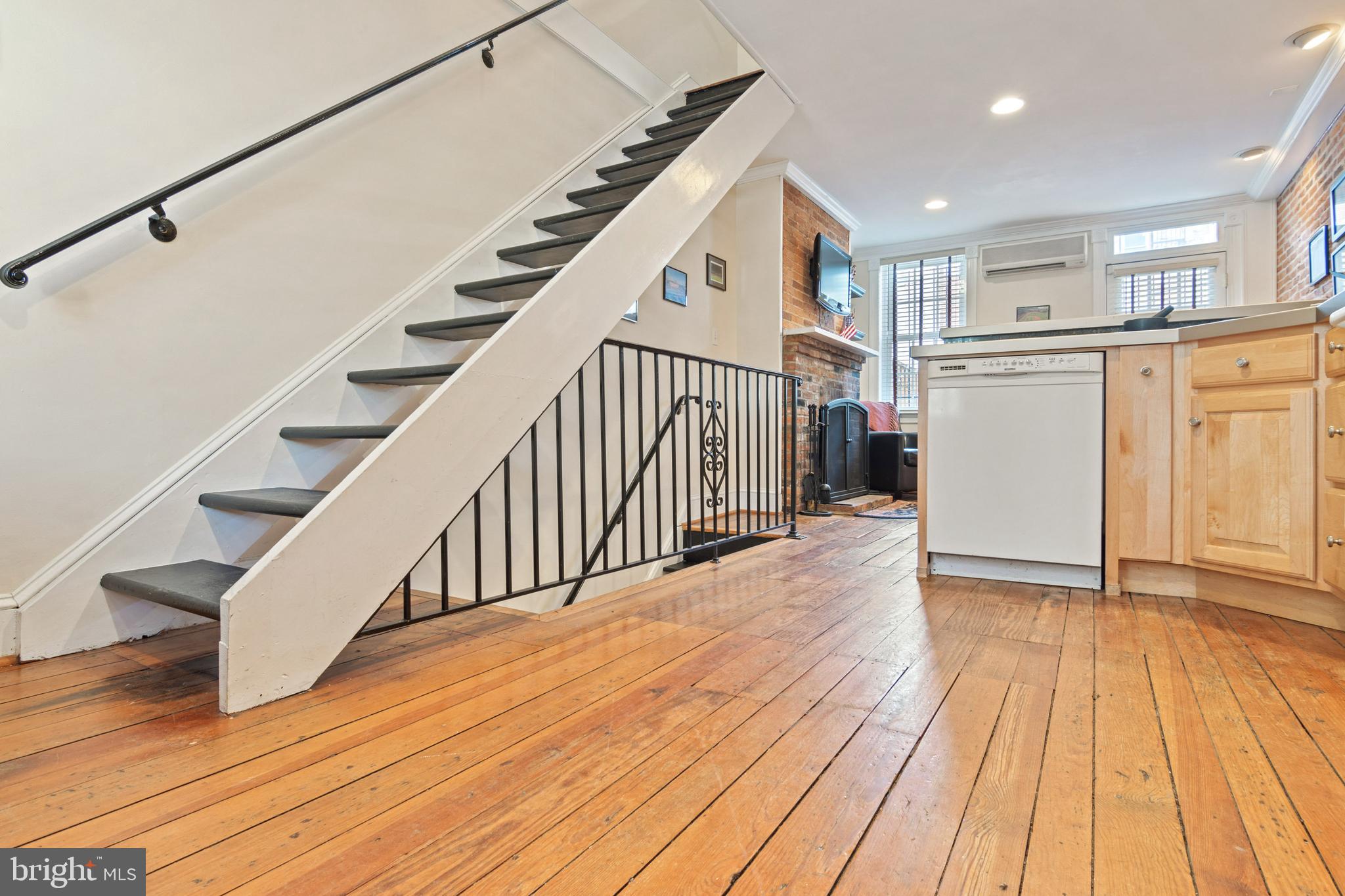 Historic charm in Ridgely's Delight. This wonderful 2 bed 2 bath home on a cobblestone street in Historic Ridgely's Delight has so much to offer. Original hardwood floors, exposed brick, stained glass features, 2 fireplaces, a unique barn door. Updated with modern ductless split HVAC systems to keep the areas cool or warm when you want - great for keeping your BGE bills low. Exit to the rear yard/patio from the main floor or the basement to enjoy a quiet escape from the city. Invite your friends over for a cookout in your own private yard/patio. Minutes from UMMC, Camden Yards, Light Rail, Inner Harbor and all major highways.