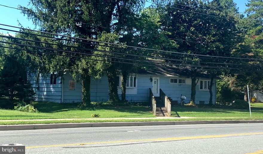 NEW PRICE!!  SELLER HIGHLY MOTIVATED.  BRING YOUR OFFER.  One level living in the sought-after community of West Severna Park.  WSP offers some of the best amenities in all of AACO.  Amenities include community beach on the Severn with brand new pier, marina with slips available (new pier in 2020), and bordered by Severn River Swim Club  & Evergreen pool(membership required)  One of the largest ranch style homes in WSP on .29 acre lot.   Located in the heart of Severna Park.  Severna Park offers Blue Ribbon schools, shopping, restaurants, library and more.  Easy access to B&A trail great for biking, jogging or  walking.  Centrally located to DC, Baltimore, Ft. Meade, and Annapolis.  You're not just buying a home you are buying into an amazing community. Main level - 4 bedrooms, 2 full baths (master bath and hall bath), kitchen, living room with wood burning brick fireplace, dining room that leads to storage room and hardwood floors on entire main level.   Kitchen updated in 2004 has spiral staircase that leads to basement.  Basement has great potential.  One side of basement was used as an apartment with full bath and kitchen area.  Other side of basement has a nice size brick wood burning fireplace and half a bath.   Driveway is on side street (Holland Rd).   Home has great potential, so bring your vision and make it your own!