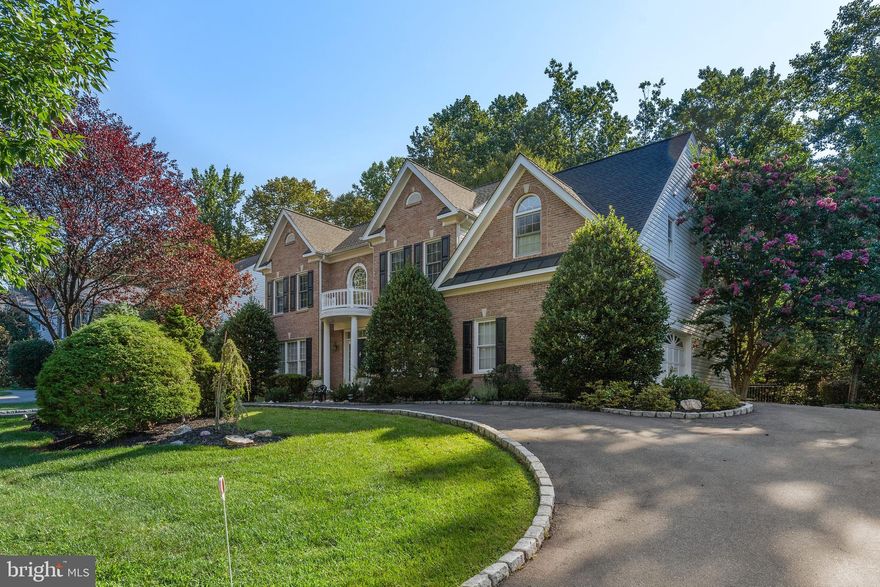 THE PERFECT 10! Luxury estate home with breathtaking design & floor plan.  Situated on private premium lot in cul-de-sac, this elegant home features an open floor plan with 4 bedrooms, 4.5 baths and over 5,000 square feet of living space.    Experience elegance when entering the 2-story grand foyer. Formal living room and dining room with decorative moldings. The chefs gourmet kitchen  with  gas cooking and center island breakfast bar, is open to the great room with custom built in bookcases, perfect for family gatherings and large scale entertaining! Beautiful stained glass windows in great room. Breakfast area & morning room with skylights and private wooded views.  Main level office/study with custom built-ins. Gorgeous hardwood floors throughout main level.   Convenient 2nd second staircase leading to upper level. A 2nd gas fireplace in living room takes the chill off a winter day. Step into the huge screened in porch with IPE hardwood  and skylights and lower stone patio.  Walk up the grand staircase to the upper level with 4 bedrooms and 3 full baths. Relax in the spacious owner's suite with gas fireplace and private luxurious bath with large jacuzzi tub sitting under a sunny window! Completely finished lower level with bar, game room & an additional full bath! New main roof 2017, new air conditioning unit, 2020. Side load garage with circular driveway.  See list of updates to this home! Please submit Financial Information Sheet, Lender Letter and EMD copy with all offers. Please wear masks, gloves, and shoe covers when viewing this property. Thanks for showing!