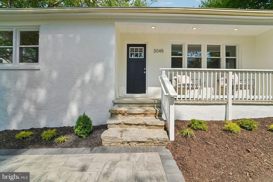 Completely updated home in sought-after Ellicott City offering modern finishes, spacious living areas, and excellent outdoor space. A welcoming front porch leads into the main level featuring a large living room with fireplace, gourmet kitchen with breakfast bar, stainless steel appliances, dining area, and wood floors throughout. The main level also includes a primary suite with private bath, plus 2 additional bedrooms and an updated hall bath. The partially finished lower level offers a spacious family room, additional bedroom, and full bath, providing flexible living space for guests, recreation, or home office needs. Enjoy the screened-in porch and rear deck overlooking the large yard, perfect for relaxing or entertaining. Conveniently located near shopping, dining, parks, and major commuter routes.  Brand new roof, HVAC, water heater and appliances.  A wonderful opportunity to own a beautifully updated home in a desirable location!
