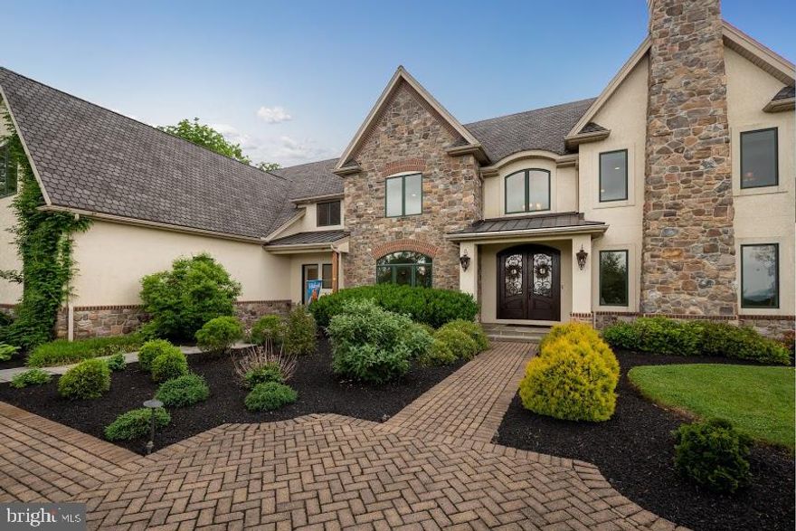 Welcome to 3635 Pheasant Hill Dr. This Custom built Monogram Home has a blend of classic appointments and some of the finest amenities that will impress the most prestigious buyer. Upon entering the Grand 2 story foyer you feel at home with the warmth of the rich hardwood flooring that flows beautifully from open room to open room.To the left of the Foyer is the Formal Dining Room with unique brick barrel vaulted ceiling, to the right is the Formal Living Room with a Gas Fireplace. Straight ahead is the open stairway with landing to the second floor, beyond to the right is a large Private Home Office. Behind the Dining room is a 1st Floor custom Wine Room complete with wet bar, wine cooler, ice maker and brick barrel ceiling. Next is the totally open concept 2 story Great Room with custom moldings, Pillars, floor to ceiling stone fireplace, tons of windows with an abundance of natural light looking over your backyard paradise with in ground sports pool with built in infinity style  Hot tub,  Open pavilion style pool house complete with bar, full bathroom with shower, large storage/utility room.  The Gourmet Kitchen features Granite Counters, Glass front cabinetry, Stone surround by commercial Gas range.  Leading from the open hallway overlooking the Great Room are double doors opening into Master Suite with bump out, gas fireplace, make up room and the incredible Master Bath with radiant heated tile floor, soaking jet tub and wall fireplace,  walk in shower, 2 separate ornate vanities with granite tops.  Walk in closet with built in dressers and black granite counter.  The basement level has a huge game area, full bath and an amazing stadium seating Home Theater with 8 leather electric reclining theater seats.  A truly must see home.