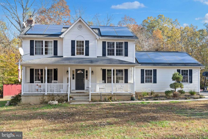 CHARMING AND SPACIOUS BEST DESCRIBES THIS FARMHOUSE COLONIAL SITUATED ON OVER 7 ACRES.  FEATURES INCLUDE: WIDE FRONT PORCH, 2 STORY ENTRY, OPEN FLOOR PLAN, GLEAMING HARDWOOD FLOORS, UPGRADED KITCHEN WITH CUSTOM MARBLE TILE WORK BACKSPLASH, AND BEAUTIFUL QUARTZ  COUNTERTOPS WITH STAINLESS STEEL APPLIANCES, FIREPLACE, LAUNDRY ROOM ON BEDROOM LEVEL, BACK DECK TO ENTERTAINING.  DOES NEEDS SOME TLC. EASY COMMUTE TO TOWN AND BACK ROAD COMMUTE TO THE CITY.  DON'T MISS THIS ONE!  MAKE IT YOURS TODAY.