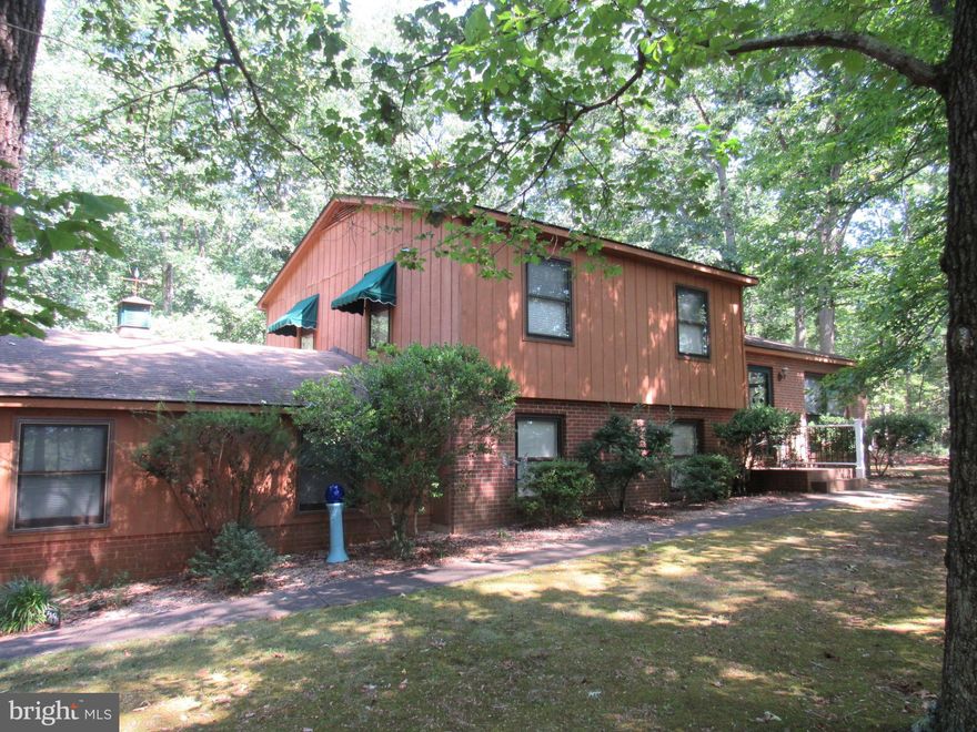 Lots to offer in Rixeyville, Va.  This home has so much to offer and will not last long.   There are 3 bedrooms and 2 baths on upper level, with new flooring throughout.  No carpet to clean.   Offers seperate dining space and kitchen on main level.   Dining room opens to rear deck that has a motorized  sunsetter awning and private views of woods and trees overlooking the back fenced yard. 
Main level has a formal living room that overlooks the front lawn with beautiful wood flooring.  Lower level has a large family room complete with wood fireplace and access to the rear fenced yard and small patio area.  There is a large bonus room with windows that faces the front of the home.  Large laundry room with full bath and access to the 2 car garage from lower level.
There is a whole house gas portable generator that is tied into the electric panel that just has to be switched on when needed.  A 1 car detached garage as well as a large shed and a small green house complete the rear of the property. There are updates and upgrades throughout the property.  Pressure tank and well pump replaced in 2020.  Heat and Ac unit replaced in 2017.  Water filter system in 2020.  This one won't last long in this market!  Includes a 1 year HSA home warranty for buyer Closing can not take place until Oct 2-10 Sellers home will be completed during this time frame.