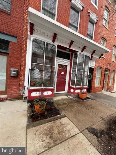 This Studio Apartment is located in the Historic District of Fells Point with large picturesque windows. Approximately 512 sq ft of space with built in shelves, a full bath and small kitchen. Property is also zoned commercial but is currently being offered as a residential dwelling. The landlord will consider a commercial lease for a bookstore, coffee shop, boutique etc. There are 4 other leased residential apartments in this building. Baltimore City will provide 1 parking pass that you can use for guest parking and 1 parking sticker for your vehicle @the annual cost of $20 each with a signed lease.