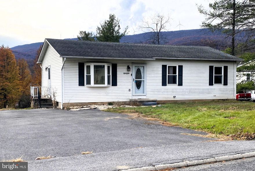 Nestled in the charming CRESAPTOWN subdivision, this delightful ranch-style home offers a perfect blend of comfort and potential. Built in 1990, the inviting exterior features low-maintenance vinyl siding, while the interior boasts warm laminate plank flooring throughout. With three spacious bedrooms and a full bathroom, this home is designed for easy living. The full, unfinished basement presents a blank canvas, ready for your personal touch—imagine a cozy family room or additional bedrooms! Enjoy the serene mountain and street views from your 0.26-acre lot, providing ample outdoor space for relaxation or gardening. The paved driveway accommodates up to four vehicles, ensuring convenience for you and your guests. This property is not just a house; it's a place to create lasting memories. Embrace the opportunity to make it your own and enjoy the comfort and tranquility it offers. Don't miss out on this gem!