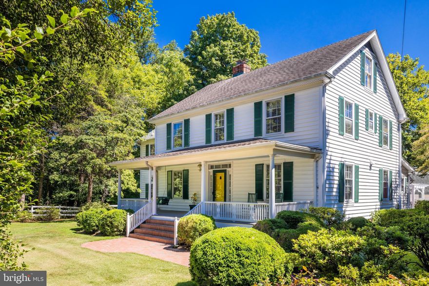 Rarely in the 21st Century, let alone inside the Capital beltway, can one be so easily transported to another place and time, yet such is the offering of Elmwood, a modern day farmhouse estate home on 1.33 verdant acres located at 4847 Ravensworth Road.  Inviting from first glance, the gentile, covered front porch graciously welcomes you to this truly splendid home.  Inside you will find an entryway flanked by formal living and dining rooms, replete with custom moldings and stunning oak floors.  Beyond these rooms are an intimate library, a warm, amiable family room, and a lovely sunroom, which all lead to the exquisite rear outdoor entertaining areas of the home.

The upper level features a gorgeous primary bedroom suite with Juliet balcony, which overlooks the breathtaking grounds.  In addition, the en suite bathroom is serene, spacious and renovated to perfection.  Three additional bedrooms, one with en suite bathroom, and a tastefully renovated full hall bathroom are also found on this level.  

The incredible outdoor spaces of this property are simply unmatched.  A lovely pergola creates an ideal outdoor entertaining space, and the connecting chevron-laid brick patio is the perfect extension, allowing for ease of use from both indoor and out.  A beautiful red barn currently houses a full woodworking shop and basketball court, yet has plenty of additional space to accommodate a new hobby or any enthusiast's collection.  The extensive and immaculate grounds have been lovingly maintained and feature numerous perennial plantings as well as boxwood cuttings from the farm on Mount Vernon.  Elmwood is a place unlike any other in the Capital region.  It is a home full of history, serenity, timelessness and tranquility, yet only minutes from the cultural riches of DC and its surroundings.