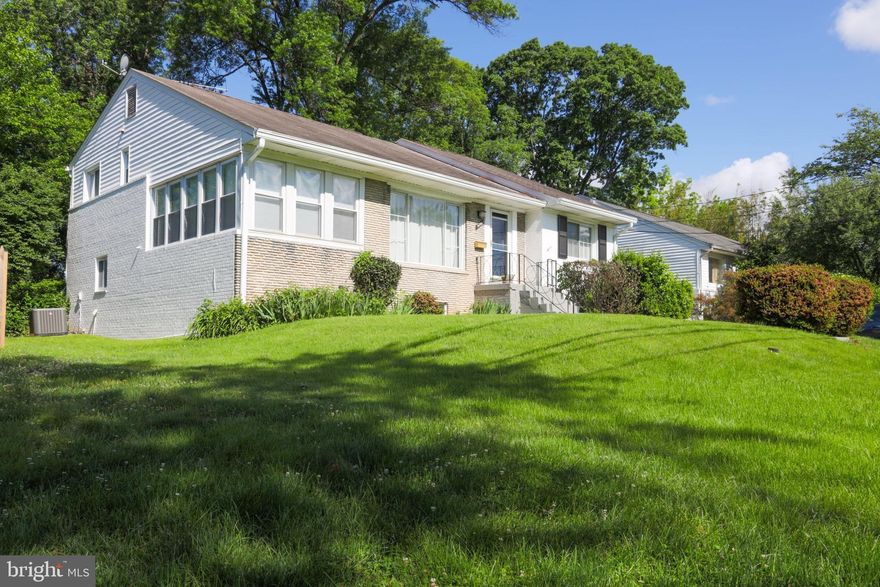 Beautiful home with cathedral ceilings, a separate dining room, and a family room with a fireplace. In a convenient location, within walking distance of the Metro.