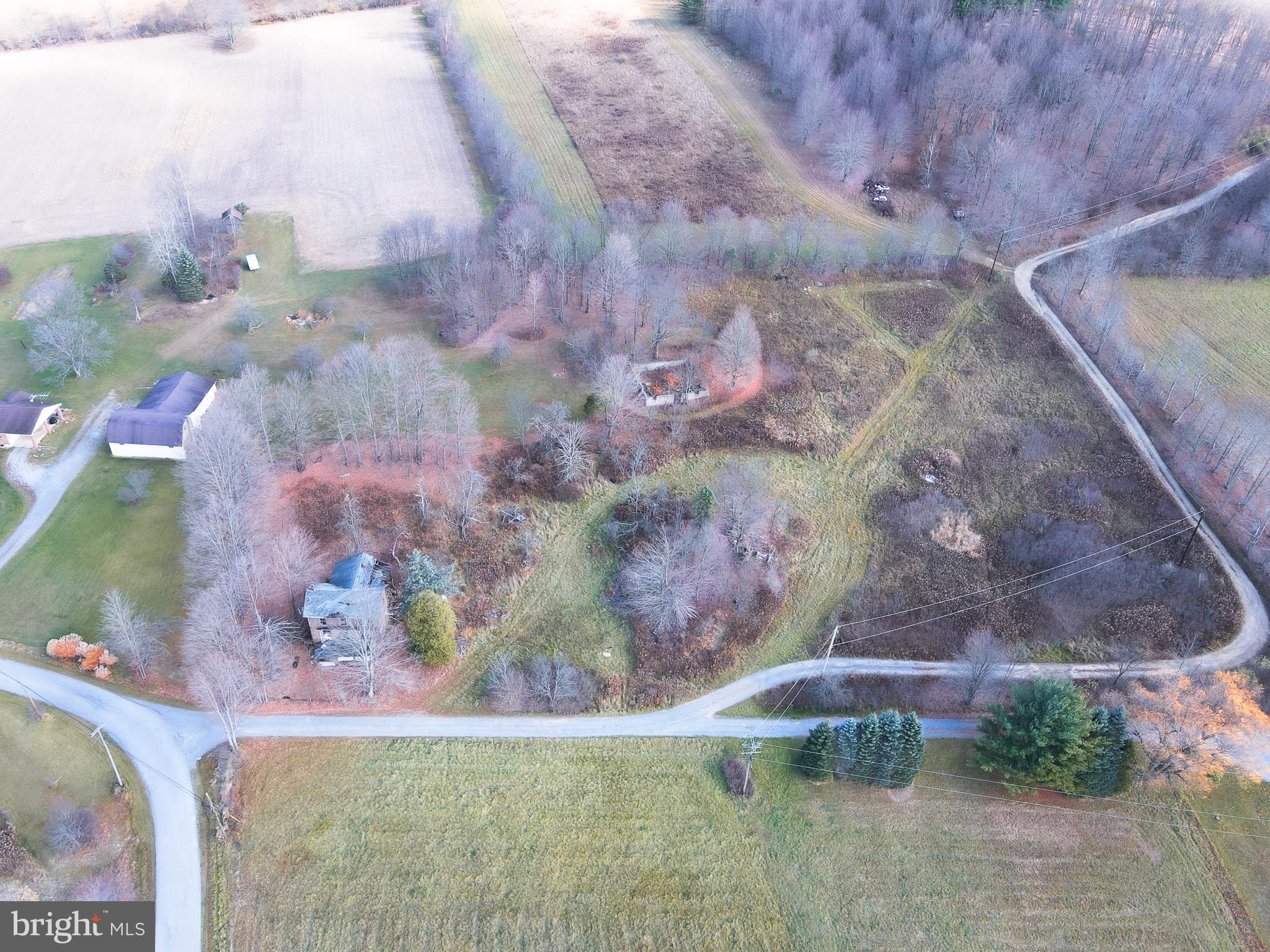 Welcome to 3.88 acres of pure tranquility, ready to become the foundation of your dream home or a rustic cabin retreat. Located on a peaceful country lane and just seconds from state game lands, this property offers both convenience and the beauty of nature. Water access is ready to be tapped, and with a completed percolation test and septic designs available, all that's missing is your vision. Embrace this rare opportunity to own a slice of serene countryside—schedule a visit today and see why this property is truly one-of-a-kind!
*** Abandoned house on the property, please DO NOT ENTER
