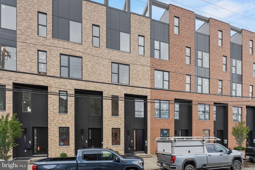 Quick delivery homes available! Over 3400 square feet, with a garage, roof deck, tax abatement and Porcelanosa finishes! 600 Fairmount is Philadelphia's brand new spectacular community ideally located at the SOUTH end of Northern Liberties, one block from Spring Garden Street! This eclection of homes vary from large single family townhomes to married townhomes and condominium-style residences all with access to garage parking. With its prominent location right off of Spring Garden, this unique enclave of homes is a convenient and fast commute to center city. The first phase of 600 Fairmount offers single family homes with various floor plans and price points available to fit your needs. The three bedroom homes include a finished basement and the first floor den could be turned into an office! Homes with private 1-2 car garage parking, expansive roof decks, and elevators are available. Most importantly, every home qualifies for the ORIGINAL full ten year tax abatement. Designed by Interface Studio Architects, every home has a unique facade that welcomes you to enter. Once inside, you'll discover a completely open main level with a living room and dining area filled with natural light from the huge windows. The stunning chef's kitchen decked out with GE Café appliances, custom Porcelanosa cabinetry and designer quartz, is sure to become the heart of the home! The lower level has the all-important 1-2 car garage parking and a bonus space ideal for a home theater, playroom, or gym. The second level has two large bright bedrooms, two full bathrooms, and a conveniently located laundry space. The primary suite covers the entire third level - your own private oasis. This space includes a massive bedroom with great natural light, a walk-in closet with space to share, and a luxurious bathroom outfitted with a double vanity, soaking tub, shower and separate commode room. Topping off this amazing home is a full rooftop deck! Be sure to review all plans to see all the amazing extras each home has to offer. The neighborhood is surrounded by massive sold out new construction projects. Nearby, Spring Garden, 4th Street, 3rd Street and 2nd Street are lined with local restaurants, shops, and markets. Fine dining, luxury shopping, and lively entertainment can be found in neighboring Spring Garden, plus Amazon Fresh a half block away, Target, Starbucks, Yards Brewery and much more are close by. The time is now to reserve your home, customize your finishes, and plant your roots for your next chapter. Square footage of 3,430 includes above and below grade. Taxes are not $1 and TBD. Taxes and square footage are the responsibility of the buyer to have verified. Photos are of the model home and may not portray actual finishes.