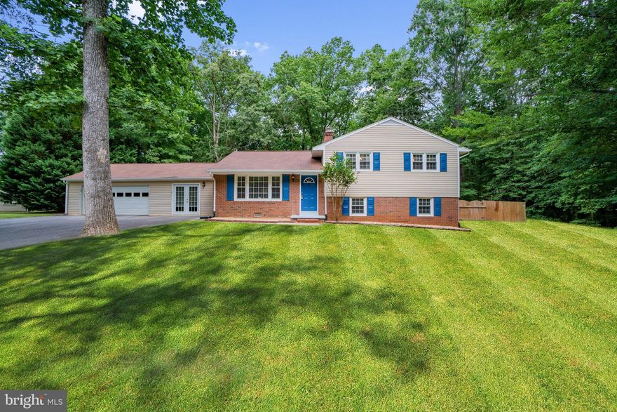 The sellers have set an offer deadline of Saturday, July 3rd at 9pm. Welcome home to 106 Holly Circle! You'll fall in love with this spacious split level on nearly 1 acre. Holly Circle is in the Argyle Heights area in Fredericksburg, Virginia. The main level is suited to entertain with a welcoming Family Room at the entrance, a large Living Room with built-in bar, and a spacious Kitchen with breakfast bar and dining area. Upstairs, you'll find 3 bedrooms and 2 full baths. The Master Bedroom has a walk-in closet and on-suite bath. The versatile fourth bedroom is on the lower level and is currently being used as a home office. Just to add to the entertainment space, the lower level also features a huge additional family room with a gorgeous brick fireplace. Outside, the vast rear yard is very private due to the privacy fence and mature trees. The concrete patio is perfect place to unwind after a long day. Be sure to schedule your showing before someone else calls this place home!