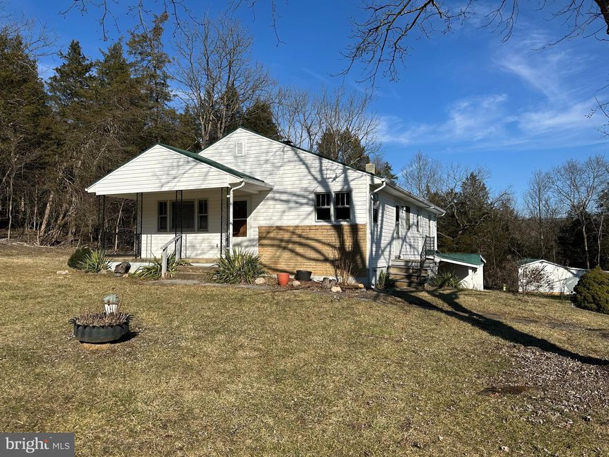 Country Roads... Take me home.  You will love this cute country home situated on 1.59 acres on a quiet country road in Page County .  The  home features Living Room, Dining Room, 3 Bedrooms all with hardwood floors, Kitchen, Bath and full unfinished basement.  Great storage building and more.  No covenants.  Just 2 hours from Washington DC and NOVA.  More pictures to come and listing will become active by February 26, so keep your eyes open.