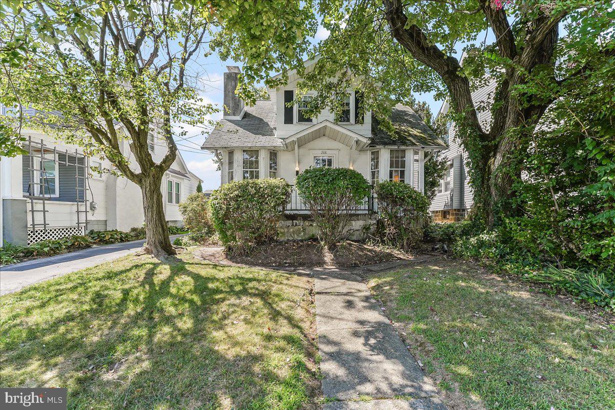 Welcome to 208 E Cleveland Avenue, a charming 4-bedroom, 2-bath home in the heart of Norwood. Built in 1920 and offering 1,690 sq. ft. of living space, this property is filled with character and presents the perfect opportunity for first-time homebuyers or investors looking to add value.
Step inside to a spacious living room featuring a brick fireplace and built-in shelving that showcase the home’s vintage charm. The first floor also includes a large dining room and a bonus room off the kitchen with laundry and a full bathroom, adding both function and flexibility to the main level. Upstairs, you’ll find four comfortable bedrooms, including one that has been thoughtfully converted into a large walk-in closet, creating boutique-style storage and organization. A second full bath completes the upper level.
Sitting on nearly half an acre (0.41 acres), the property boasts a generous yard with plenty of room for gardening, entertaining, or future expansion. The home also features a shared driveway, providing off-street parking in addition to street parking. With solid bones and classic details, this home is an excellent canvas for customization. 208 E Cleveland Avenue is a wonderful opportunity to create the home you’ve always envisioned, nestled near schools, parks, shopping, I-95, and SEPTA regional rail. It offers the perfect blend of small-town charm and easy access to Philadelphia.
This property also qualifies for a seller credit up to $2,750 (Sales Price $275,000) towards buyer’s closing costs or interest rate buy downs. Buyer is not obligated to use Bill Rookstool of CrossCountry Mortgage to have offer accepted; however, must use Bill Rookstool to qualify for the credit. Restrictions apply. NMLS 137765, NMLS2013300, NMLS3029.