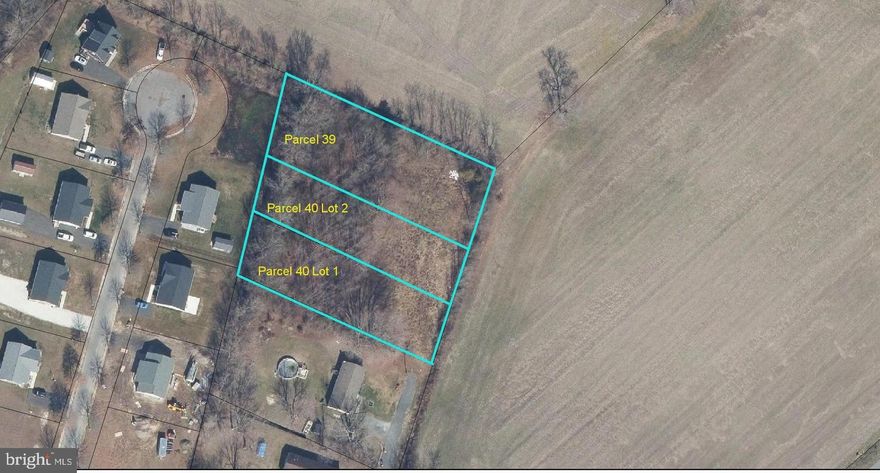 Opportunity to own three building lots totaling 1.473 acres within the town limits of East New Market. Comprised of TAX ID: 1002285924, 1002020580, 1002027879. Whether you envision one spacious homesite or three individual builds, the flexibility is yours. Public Water and Sewer hookups are available- buyer to confirm all info and fees associated with tie in (fees are per house built). Town of East New Market is the governing body.  Located in the Warwick School District with easy access to nearby amenities. Nearby perks include: Suicide Bridge Restaurant and other local eateries, Public Boat Ramp in Secretary, quick access to schools, and more! **lot lines in photo are approx. based on overhead parcel view**