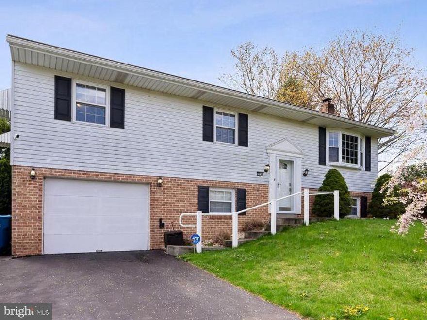 Wow!  Updated split foyer with 4 bedrooms, 3 full bathrooms, and 1 car garage!  Stunning modern kitchen with Corian countertops, stainless steel appliances, white cabinets, tile backsplash, and recessed lights!  Upgraded flooring throughout the home includes LVP, engineered hardwood, and luxurious faux-wood tile!  Cozy sunroom off the kitchen leads to the backyard with patio and retractable awning.  Lower-level recreation room boasts a woodburning fireplace, 4th BR, full bathroom, bonus room, and utility room with washer and dryer.  Relaxed living with no HOA just outside Harrisburg with easy access to 81, and only 15 minutes from Hershey Park!