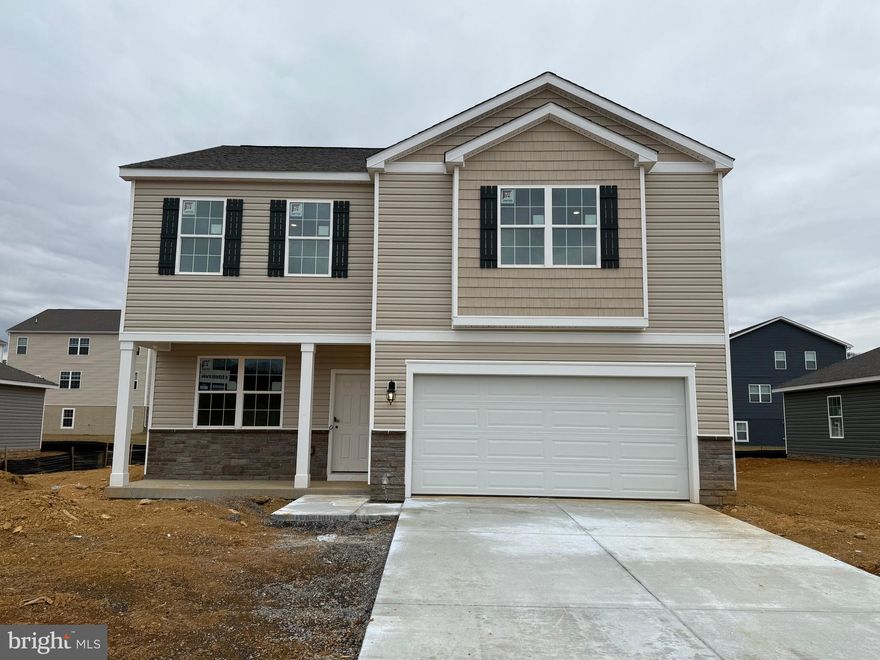 Tucked away on a quiet cul-de-sac, this two-story, 4-bedroom, 2.5-bathroom home combines elegant design with modern features. The main floor is highlighted by stylish LVP flooring, while the kitchen boasts sleek stainless steel appliances. The stone accents on the front of the house add character, and the covered porch offers a tranquil space to enjoy the partial mountain views. Located just moments away from local schools and shopping, this home is perfect for families seeking both convenience and scenic surroundings.