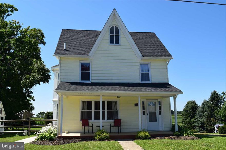 Move right into this spotless, completely remodeled 3-story Victorian! Foyer entry, modern Kit w/ custom cabinets & pantry, DR w/ bow window, MBR w/sitting rm & W-I closet, huge 2nd fl BA, 1st fl Lau & 1/2BA, mud rm & more. Updated windows, siding, gutters, furnace, CAC & septic. Almost 1/2 ac level lot w/deep backyard & fenced play area. 5 min from PA/MD Line!