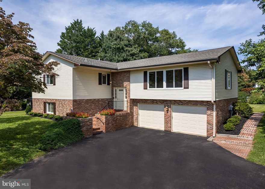 Home is Occupied/ Must Set Appointment. Don’t miss seeing this beautiful and well maintained home in the desirable Evergreen Valley Estates community featuring main level living and almost an acre of level and open yard space to enjoy. Offering a spacious, bright, and open living and dining room floor plan with large Anderson sliding windows and custom Bali blinds. Brand new carpet, flooring, paint and lighting fixtures makes this home fresh and ready to move in! Family room connected to the kitchen with a slider to the covered and screened in porch. Kitchen features granite countertops, cherry wood cabinets and tile flooring with space for dining.  Three spacious bedrooms located on the main level include a large primary bedroom with en suite bath and walk-in closet. The fourth bedroom on the lower level is currently set up as a professional home office with two workstations and custom  desk, shelving and cabinetry perfectly suited to work from home/homeschool. Large finished ground level family room with wood burning fireplace, powder room, and area for entertaining, gathering or a home theatre. Separate laundry room with chute from above. Plenty of storage including utility room/workshop with shelving, oversized garage, and closets throughout the home. Located in western Howard county with easy access to shopping, dining, entertainment, parks and recreation, plus great schools. You’ll feel right at home with plenty of living space indoors and outdoors within a great neighborhood! Street has recently been paved.