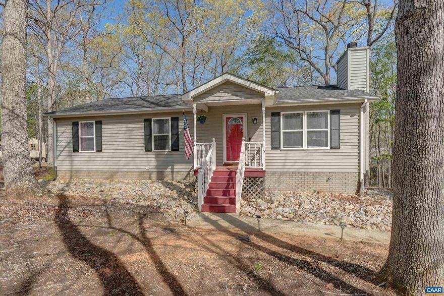 Welcome to this beautifully updated ranch-style home in the highly sought-after Lake Monticello community! Offering approximately 2,350 square feet of finished living space, this 4-bedroom, 3 full bath home combines comfort, functionality, and modern updates in a serene lake setting. Step inside to discover an updated kitchen featuring granite countertops and a functional layout perfect for everyday living and entertaining. The main level includes a convenient first-floor bedroom with a full bath, while the fully finished basement?complete with brand new carpet?provides additional living space, a full bathroom, and a versatile workshop area. Enjoy outdoor living with a brand-new back deck overlooking the property, along with thoughtful exterior improvements including a retaining wall and drainage system. The home also features a newer HVAC system (2019), a roof replaced in 2013, public water and sewer, and fiber internet availability for modern convenience. Located on a .35-acre lot in a gated community, residents enjoy access to exceptional Lake Monticello amenities including a private lake, beach, marina, golf course, pool, clubhouse, and more. HOA includes road maintenance, snow removal, trash service, and limited yard mainten