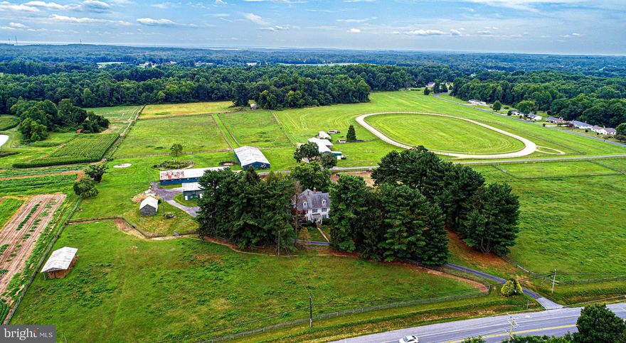 Church Mouse Meadows is a rare opportunity to own a piece of Maryland history.  The Richardson-Worthington House dates back to 1890 and resides on more than 45 beautiful acres of gently rolling farmland in Churchville.  The property includes 3 horse barns with 45 stalls, 2 run in sheds, 4 additional outbuildings and an inground swimming pool with a pool shed, a mobile home and a training track.  This over 4,000 square foot home has many unique and elaborate features including an entryway staircase with its newel post carved with Roman Doric columns and a metal pilgrim statue carrying an electric lantern on top of the post.  The living room and dining room have back-to-back fireplaces with cornice mantels and walls with wainscoting.  It has 1 1/2 upper floors with a primary bedroom and 5 additional bedrooms.  Property contains 4 remaining development rights and has frontage for possible subdivision or take advantage of the agricultural preservation programs Harford County offers.  Churchville is located minutes away from beautiful downtown Bel Air and has easy access to I-95  making commuting and transporting horses convenient all Mid-Atlantic tracks.