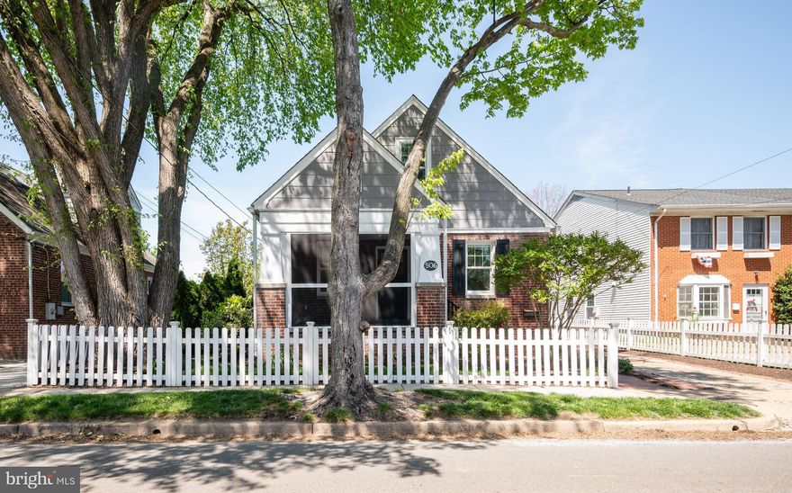 Welcome to 506 E Windsor Ave where you'll be greeted by a white picket fence enclosing the landscaped front yard. The large screened-in front porch invites you to relax and enjoy the beautiful surroundings. Enter into the living room - with great natural light and plenty of space to relax, this space flows easily into the separate dining room, complete with chair rails and crown molding. To the rear, kitchen is equipped with stainless steel appliances, granite countertops, and shaker cabinetry. Rounding out the main level are two inviting bedrooms and a full bathroom. Venture upstairs to the gorgeous primary suite! The front room is great as a home office space or extra TV room. The full bathroom was recently renovated with gorgeous tile and a walk-in shower with frameless door. The primary bedroom features custom built-in drawers and a spacious closet with an organizational system, perfect for keeping your belongings neat and tidy. Head downstairs to the lower level, which offers an array of amenities for relaxation and entertainment. A recreation room with separate bedroom area, a full bathroom, a convenient kitchenette and plenty of storage space to meet your needs. Step outside and relax in the fully fenced backyard. A large deck provides the ideal setting for outdoor gatherings and al fresco dining, while a lush garden adds beauty and tranquility to the space. The shed offers storage for tools and equipment, keeping your outdoor space organized and clutter-free.  Located less than a mile to the metro and I-395 makes commuting a breeze!  Park in your driveway and walk to the Avenue for an array of restaurants, shopping, and entertainment.  Welcome Home!