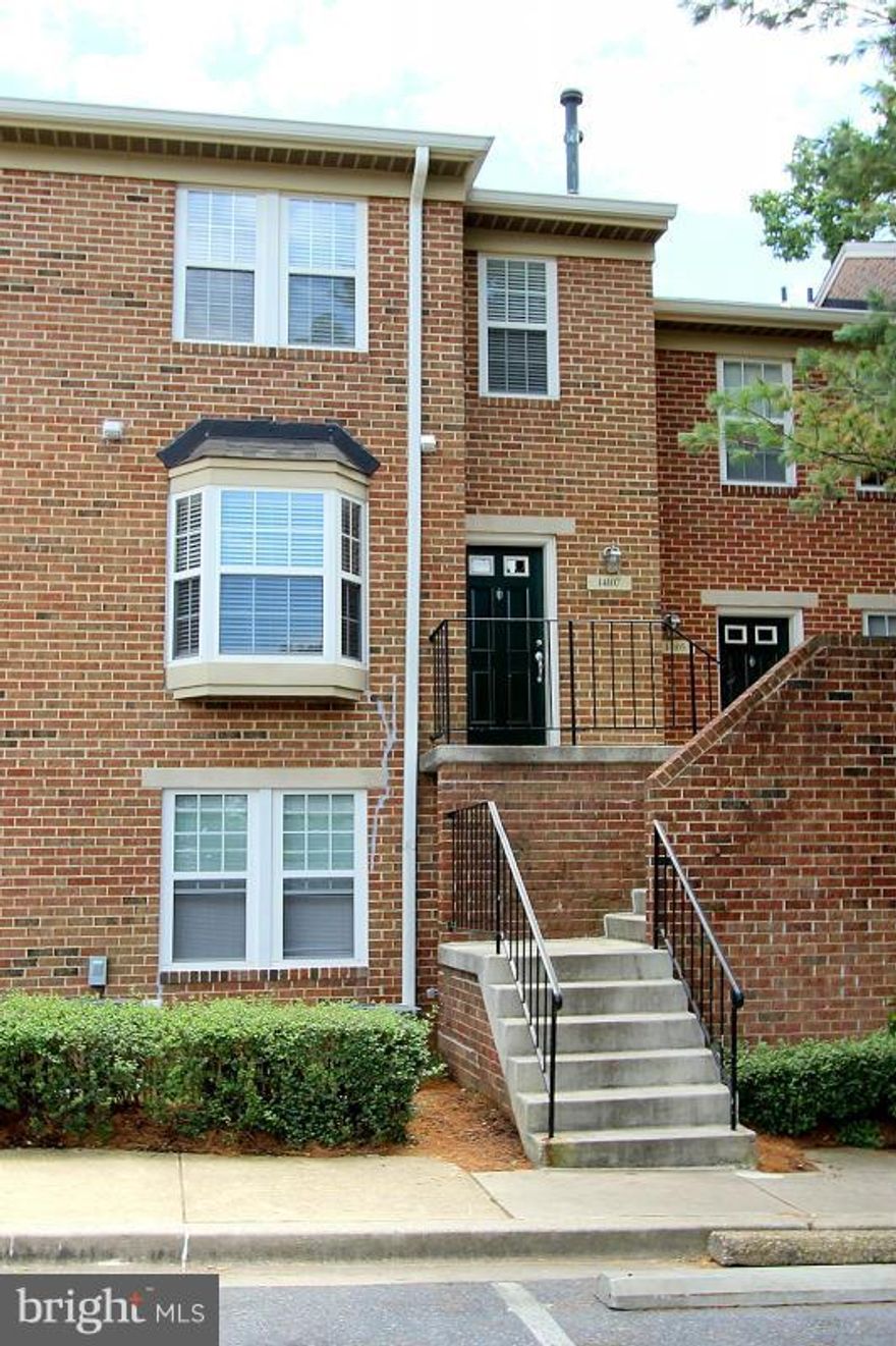 Wonderful two level Condo in a gated community featuring 3 bedrooms and 2 1/2 baths. Beautiful Bamboo flooring, large kitchen with granite counters and stainless steel appliances. Washer and Dryer in unit. Double french doors off the family room lead you to the  outdoor balcony. Community pool, close to Metro, shopping, and restaurants. Welcome Home!