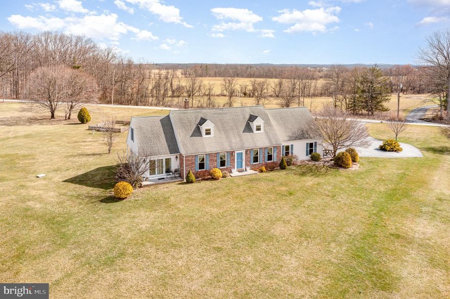 What a beautiful place to call home! Enjoy panoramic views year round from the comfort of your home in this spacious Cape Cod situated on 2.16 acres in Gettysburg School District! This move-in-ready home features a bright and welcoming floor plan with lots of natural light, beautiful hardwood floors, separate living and dining rooms, an eat-in kitchen with a center island, pantry, and stainless-steel appliances, a large sunroom off of the living room perfect for family gatherings and entertaining, a main floor primary bedroom and full bathroom, and so much more! The second floor features two spacious bedrooms, a bonus room, and an additional full bathroom. The lower level is unfinished offering ample space for storage and the possibility to add even more living space in the future. Outside features a beautiful 2.16 acre lot with a patio on the front and back of the home perfect for taking in the views of wildlife and nature.