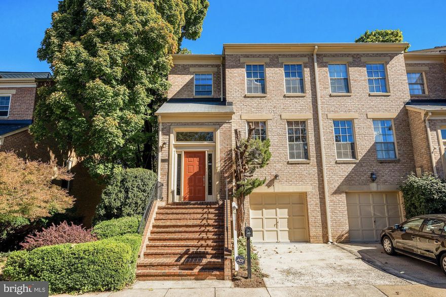 Welcome home to this beautiful, end unit garage townhome in the desirable McLean Mews. This all-brick, lovely townhome with 3 bedroom, 2 full and 2 half bath provides fantastic living space. High ceilings, decorative crown moldings and wide plank Brazilian Cherry hardwood floor adorn this beautiful home. Main level boasts elegant entry through a marble foyer, a spacious, well-lighted living room and a formal dining room. Tastefully upgraded kitchen with designer cabinets, granite countertops and stainless steel appliances opens to a cozy light-filled family room with custom built-ins. Upper level offers a large master suite with  two closets including a walk-in, master bath with separate shower and tub. Two additional bedrooms, full bath and additional storage makes this an excellent layout. The fully finished, walk-out basement offers a large recreation room, wood burning fireplace,  half bath, spacious laundry room and utility room with additional storage. Large, private concrete patio for entertaining. Well-maintained and cared-for home. New HVAC system November 2019.  Walk to  McLean downtown, cafe, restaurants, groceries and nearby businesses. Great commuter location with minutes to major routes, highways and Silver Line metro. Easy commute to DC. In the heart of McLean, but away from busy streets. Top rated McLean schools - McLean, Longfellow and Franklin Sherman. Kids-friendly neighborhood with occasional community activities. Plenty of visitor parking through the community. This home offers practical and comfortable living in style in a great community.