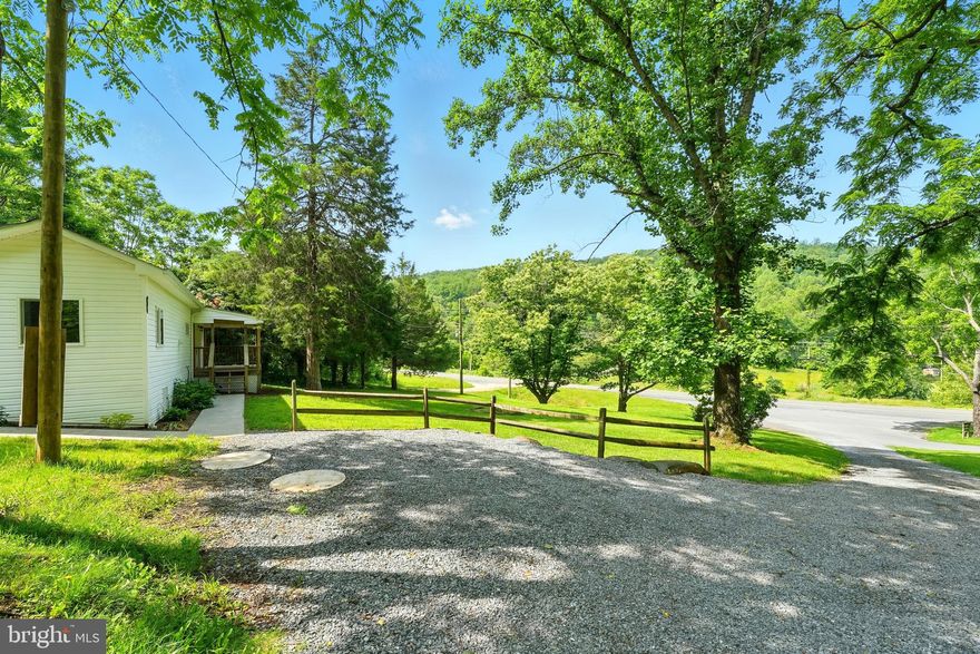 Charming Renovated Cottage in Front Royal
1 ACRE | MODERN UPDATES | MINUTES TO APPALACHIAN TRAIL & DOWNTOWN
If you’ve been dreaming of a cozy retreat with a modern touch and a connection to nature, this delightfully renovated 2-bedroom, 1-bath cottage on a private 1-acre lot in Front Royal may be your perfect match.
This home has been thoughtfully updated with all new appliances, on-demand hot water, mini wine fridge, and sleek updated cabinetry and countertops in a bright and functional kitchen. The entire interior has been freshly painted, and comfort is ensured year-round with brand-new mini splits for heating and cooling.
In the living room, a cozy nook awaits your wood stove—just imagine curling up with a book after a day on the trail. Step outside and enjoy your own private slice of nature: a beautiful stone wall lined with wild bramble berries behind the home, and two majestic chestnut trees welcoming you in the front yard.
Location perks: Only 1 mile to an Appalachian Trailhead—ideal for hikers and outdoor lovers. Short drive to downtown Front Royal with local restaurants, art, and live music. High-speed internet available—so you can stay connected while tucked away in peace.
This property offers the best of both worlds—rural serenity with modern comforts and vibrant small-town culture just minutes away. Whether you're seeking a full-time residence, weekend getaway, or a stylish short-term rental, this lovingly updated home is move-in ready and full of charm.
 A rare blend of style, simplicity, and natural beauty—come make it yours.
No HOA