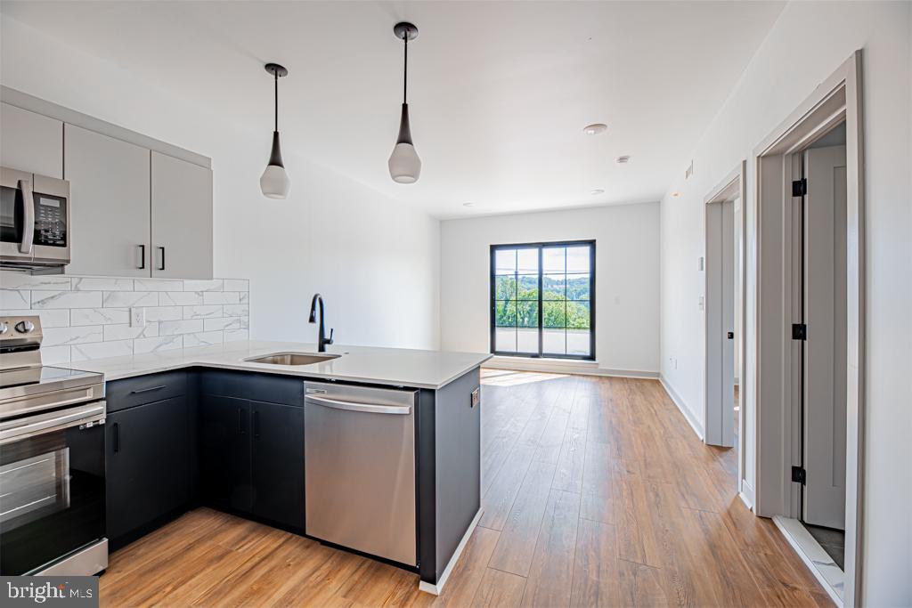 Available June 1st! - Spacious 1-bedroom home with private balcony at Industry Lofts - a new construction apartment community in the heart of Roxborough! Your new home includes open-concept living/kitchen area with fully-equipped kitchen including granite countertops and stainless steel appliances. Easy-to-clean wood-inspired flooring throughout, plus in-unit washer/dryer, and intercom system. Plus, Industry Lofts is 100% pet-friendly with no additional fees! The home is a must-see - apply today!