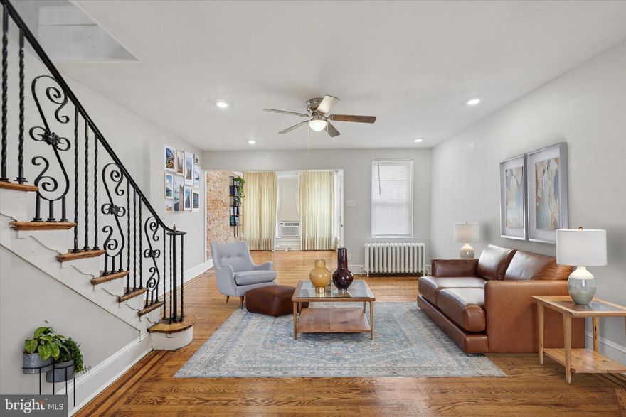 Welcome to 2112 N 57th Street, Philadelphia, PA 19131. Located on a quiet block in the desirable Wynnefield section, this beautiful home opens into a spacious living room and dining area—perfect for entertaining or relaxing. The renovated kitchen features a center island and brand-new stainless steel appliances, including a refrigerator, dishwasher, microwave, and stove. With 3 generous bedrooms, 2 full bathrooms, and 1 convenient half bath, the home offers comfort and functionality throughout. The finished basement provides direct access to your driveway, while the enclosed front porch adds a cozy space for morning coffee or evening unwinding. Situated within walking distance to St. Joseph’s University and City Avenue, and close to public transportation including bus routes and regional rail lines, this property offers easy access to Center City and surrounding neighborhoods. Whether you're a first-time buyer or an investor seeking a prime opportunity, this home combines location, space, and potential. Don’t miss your chance to own a piece of Wynnefield