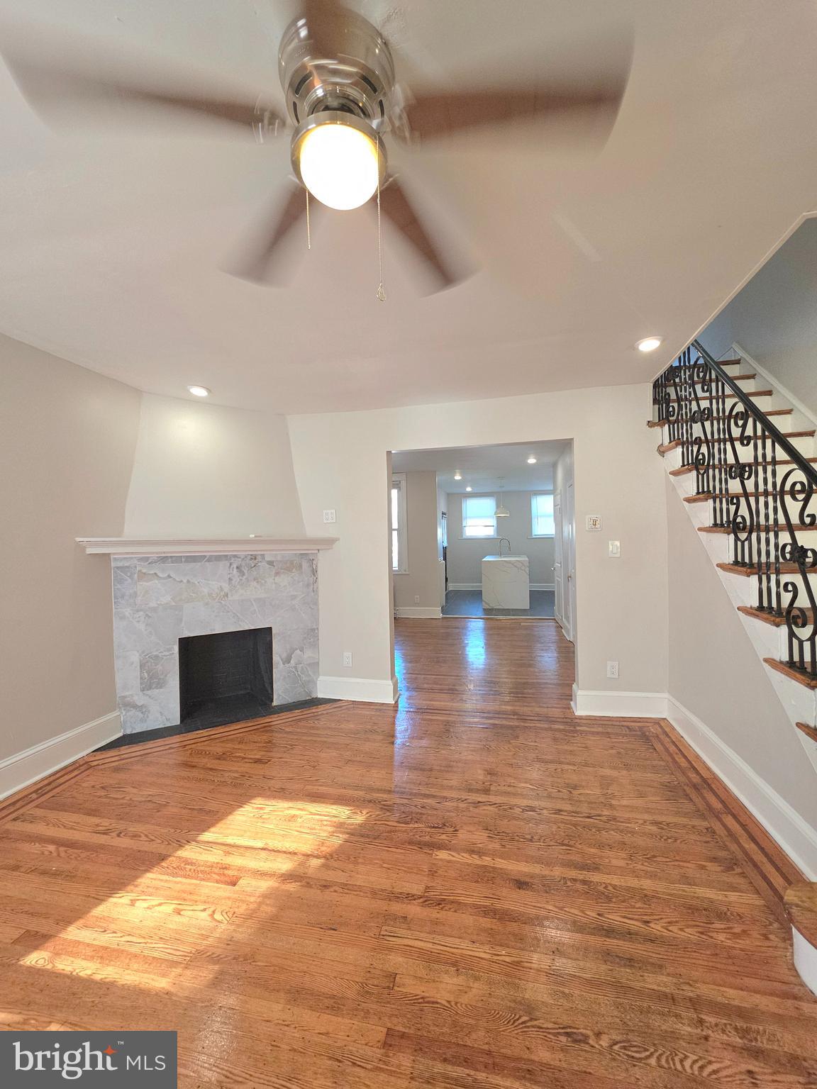Welcome to 2112 N 57th Street, Philadelphia, PA 19131. Located on a quiet block in the desirable Wynnefield section, this beautiful home opens into a spacious living room and dining area—perfect for entertaining or relaxing. The renovated kitchen features a center island and brand-new stainless steel appliances, including a refrigerator, dishwasher, microwave, and stove. With 3 generous bedrooms, 2 full bathrooms, and 1 convenient half bath, the home offers comfort and functionality throughout. The finished basement provides direct access to your driveway, while the enclosed front porch adds a cozy space for morning coffee or evening unwinding. Situated within walking distance to St. Joseph’s University and City Avenue, and close to public transportation including bus routes and regional rail lines, this property offers easy access to Center City and surrounding neighborhoods. Whether you're a first-time buyer or an investor seeking a prime opportunity, this home combines location, space, and potential. Don’t miss your chance to own a piece of Wynnefield