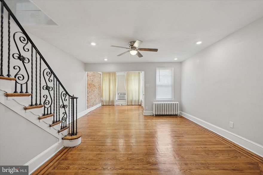 Welcome to 2112 N 57th Street, Philadelphia, PA 19131. Located on a quiet block in the desirable Wynnefield section, this beautiful home opens into a spacious living room and dining area—perfect for entertaining or relaxing. The renovated kitchen features a center island and brand-new stainless steel appliances, including a refrigerator, dishwasher, microwave, and stove. With 3 generous bedrooms, 2 full bathrooms, and 1 convenient half bath, the home offers comfort and functionality throughout. The finished basement provides direct access to your driveway, while the enclosed front porch adds a cozy space for morning coffee or evening unwinding. Situated within walking distance to St. Joseph’s University and City Avenue, and close to public transportation including bus routes and regional rail lines, this property offers easy access to Center City and surrounding neighborhoods. Whether you're a first-time buyer or an investor seeking a prime opportunity, this home combines location, space, and potential. Don’t miss your chance to own a piece of Wynnefield