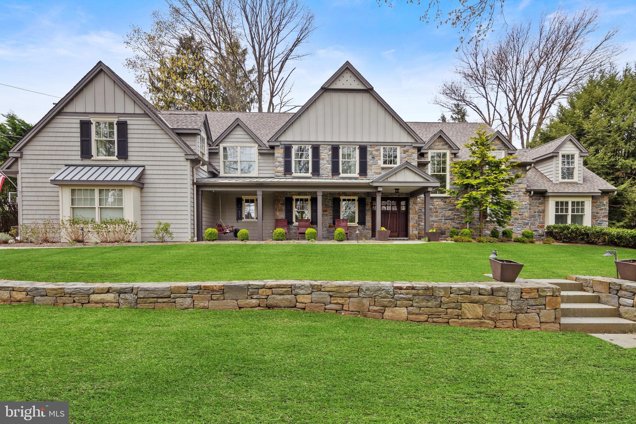 It is my pleasure to present this truly spectacular home in the popular Shand Tract neighborhood of Tredyffrin Twp. As the personal home of Pete Jonak, owner of prestigious Spire Builders, no expense was spared or detail missed in creating this masterpiece. Built of the highest quality materials and craftsmanship by Spire, and designed by acclaimed architect Rene Hoffman, this custom 5-6BR, 5.5 bath home has an open floor plan with all the modern amenities today’s buyers are looking for! The stunning design offers great curb appeal with it's interesting roof lines, intricate detail, beautiful stone façade. and charming
front porch – truly impressive! The .89 ac private fenced rear yard is flat and open with mature landscaping around the perimeter and has numerous flagstone patios including a built-in firepit and a covered patio area. Perfect for entertaining! Inside, the custom open floor plan is perfect for everyday living and entertaining. The expansive gourmet kitchen has top of the line appliances, quartzite countertops, custom cabinets, huge walk-in pantry and every perk you could want. The kitchen is open to the breakfast room with charming nook with bench seating, and also to the family room with floor to ceiling stone fireplace, and cathedral ceiling with exposed beams. Both the family room and kitchen have an abundance of windows with great views of the property, and sliders to the covered patio. There is a formal living room which current owner uses as a play room. The 6th bedroom has a full bath that is handicap friendly with a roll in shower and is also located on the main floor for easy access. This space has built in desks and can also be used as a home office. This house was designed with flexibility in mind as you can use many rooms for different purposes.
Upstairs you will have the primary suite with expansive walk-in closet and luxury bath with steam shower and jetted tub. Two additional bedrooms have ensuite baths while two other bedrooms share a Jack and Jill bath. All bedrooms are generously sized and have walk in closets. There is also a TV area/2nd family room on the 2nd floor as well as the convenient laundry. The newly finished lower level features a state of the art media room with projection TV, screen, serving bar as well as an expansive gym.
No money was spared in making this house safe and energy efficient! There is a Carrier Green Speed ultra high efficiency electric heat pump with a 20 SEER rating! (avg electric bill on this home is an astounding $410/mth!) There are 4 zones of HVAC and a steam humidifier to keep the house at a constant 40% humidity level in winter. To purify the air and keep germs out, air scrubbers have been added and there is an ERV (Energy Recovery Unit) to bring in fresh air and get rid of stale air. Other systems include a Lutron lighting system, a Sonos system throughout, a whole house water softener and water purification system, Central vac, a Moen Flow and Water Cop System, a generator and an extensive security system.
This is a unique opportunity to own a very special home of the highest craftsmanship in one of the best neighborhoods on the Main Line and one of the best school districts in the country! Showings start approx. May 13/14.