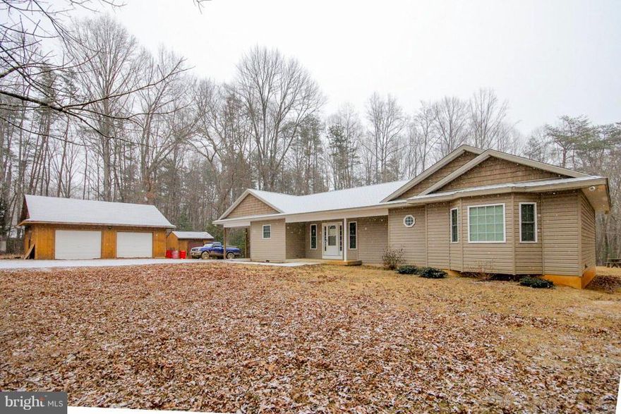 ONE OWNER HOME Built in 2011!  Over 3 acres of land on quiet lot.  Sit on your screened porch and watch the deer roam.  Great deck for entertaining. 3 bedroom home with vaulted ceilings.   Very nice condition! Detached garage for those weekend projects, ready for your woodstove.  THIS home is priced below assessment!   Bring your livestock and enjoy the country. Close commute to Fredericksburg.