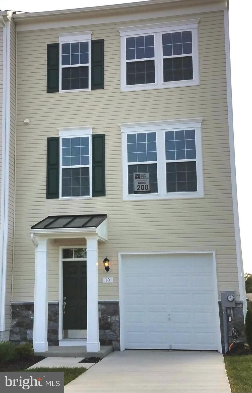 Dan Ryan Builders Riverside Villages offers a new set of Yorktown II 3level townhomes for IMMEDIATE DELIVERY! Buy yours now! This end unit has a stylish stone detail on the front & over 2000 finished sq.ft. with 12''Morning expanded plan, open island kitchen/dining with stainless appliances, huge owner's suite, spacious 2 room finished, walkout lower level. Minutes to MD line. 2x6 construction!