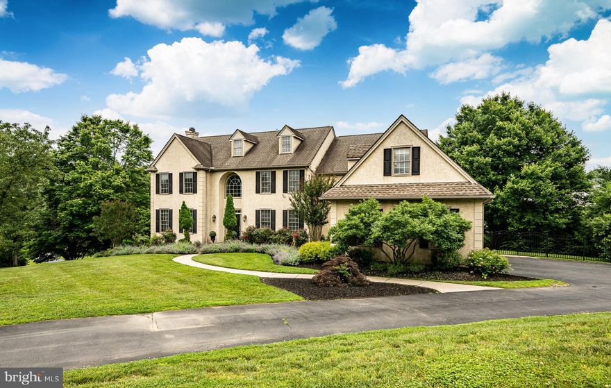 Simply stunning is how to describe 4 Taylor Chase Lane best. The home is situated on top of a hill with beautiful views over the surrounding countryside, in an enclave of just four homes on a private road. No detail from the gorgeous hardwood floors, high ceilings, crown moldings, and more has been missed. On the main floor is a living room, dining room, and family room with a vaulted ceiling and fireplace. The home office is spacious, private, and has a fireplace.  The large kitchen features Wolf appliances and a large breakfast room overlooking the backyard. There is a large deck off the kitchen. 
The upper floor has a primary suite with a sitting area that offers a large window overlooking the rolling fields. There is also ample walk-in closet space and a great en-suite bathroom. 
The second and third bedrooms share a jack-and-jill bathroom. The fourth bedroom has a full en-suite bathroom. The flex space would be good for a fifth bedroom, home office, or more. 
The lower level has a large rec room, full bathroom, workout area, fireplace, and French doors leading out to the patio and custom stone pool. The backyard is a beautiful escape where you can relax by the pool.  Located in the award winning Unionville-Chadds Ford school district with easy access to Rt 202, Rt 1, West Chester, Wilmington and Philadelphia.