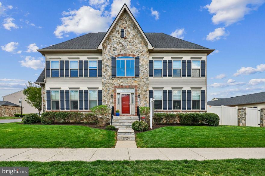 Welcome to this spacious end-unit townhome at Wormans Mill. Enjoy the open-concept living built for entertainment and relaxation. The inviting foyer opens into the cozy living space that includes the dining area and great room with a gas fireplace, separated from the kitchen by an island with seating. All stainless steel appliances complement the hardwood floors, warm cherry cabinets, and granite countertops. The primary bedroom suite on the first floor is spacious, with a walk-in closet and a private bathroom with a large walk-in shower, and double sinks. Two additional bedrooms and a full bath are located on the second level. The laundry room with a washer, dryer, and storage is also conveniently located on this level. The lower level is unfinished but ready for easy buildout.  There is a fenced-in courtyard off the first level that leads to the two-car garage. Near historic Frederick and Carroll Creek events. Don’t miss this opportunity to visit this gem and check out the bountiful amenities that Wormans Mill offers, such as the clubhouse with a workout room, large living room/library, and full kitchen. Other amenities include tennis courts, a pool, pickleball courts, and basketball courts. Located near multiple major highways, shopping, and restaurants.