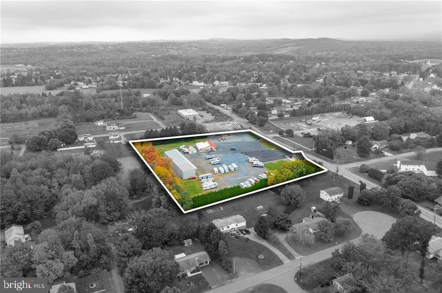 Expansive 5.05-acre commercial site strategically positioned along busy Route 512, just off the intersection with Bushkill Center Road boasting ample opportunities for various ventures. Seller willing to consider personal-financing arrangements up to $1 million. The site currently features 3 retail buildings, 3 residential units (one vacant), and an RV storage parking facility. Flexibility for reconfiguration is inherent, catering to diverse potential uses. The retail establishments encompass a drive-through fast-food stand, an upscale tack-shop, and a compact car dealership. Additionally, a substantial metal structure with a concrete floor occupies the rear section, serving as undercover storage for RVs and boats. Recent renovations were made to the automotive office and residential apartments. Current gross income stands at $150,000 annually, with potential to exceed $160,000 post-leasing of the third apartment. The property has potential for pad sites for pharmacy, bank, food and more. An adjacent parcel with direct access to Bushkill Center Road may be procurable at an extra cost.